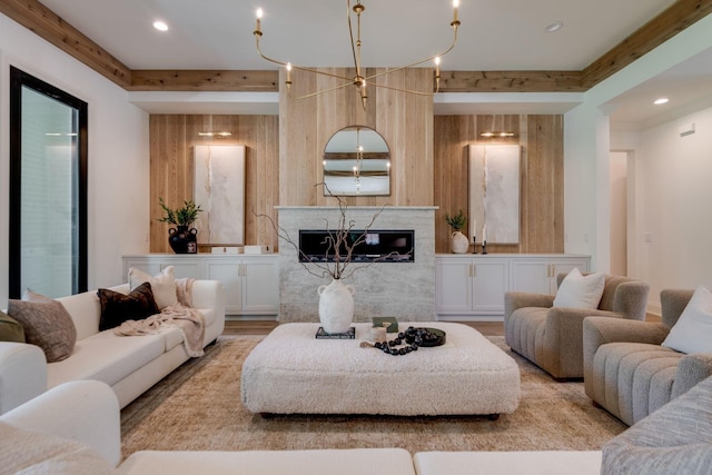 living room with wooden walls and beamed ceiling