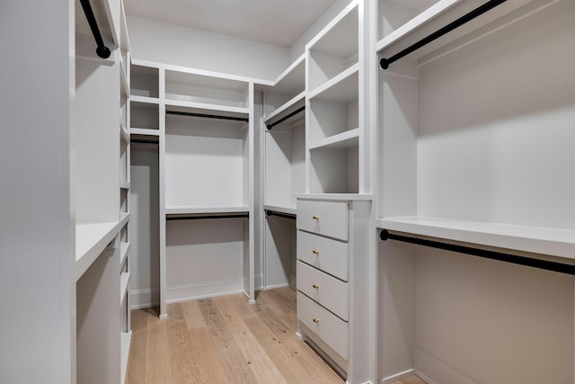 walk in closet featuring light wood-type flooring