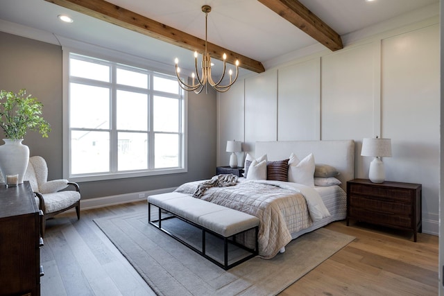 bedroom with wood-type flooring, a chandelier, and beamed ceiling