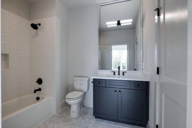 full bathroom featuring toilet, vanity, and tiled shower / bath