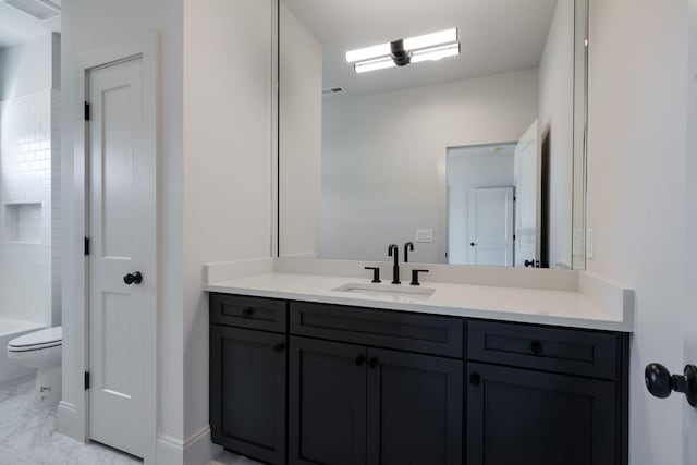 full bathroom featuring shower / bathing tub combination, vanity, and toilet