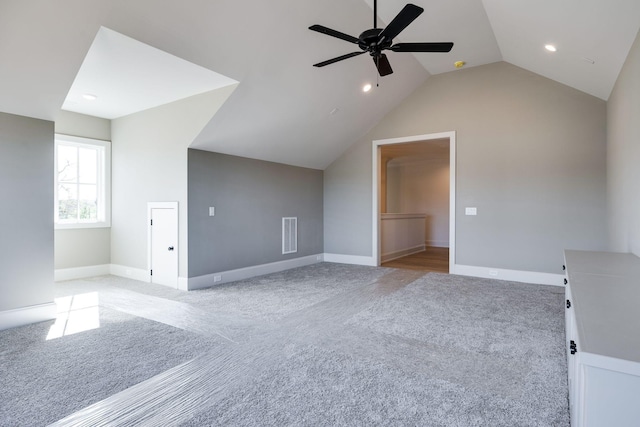 bonus room featuring ceiling fan, vaulted ceiling, and light colored carpet