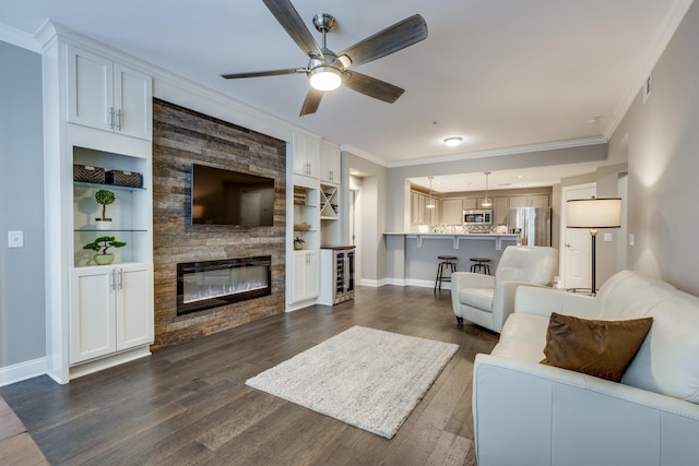 living room featuring a stone fireplace, ceiling fan, built in features, wine cooler, and dark wood-type flooring