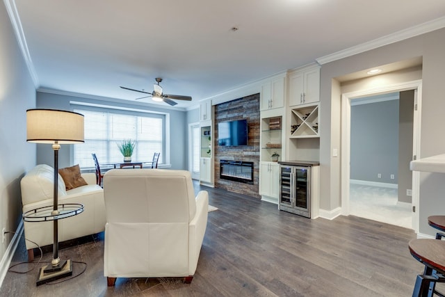 living room featuring dark hardwood / wood-style floors, built in shelves, wine cooler, ceiling fan, and a stone fireplace