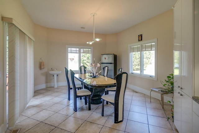 view of tiled dining space