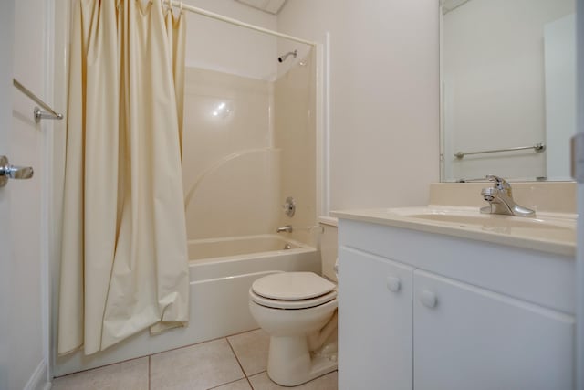 full bathroom featuring tile patterned flooring, shower / bath combination with curtain, vanity, and toilet