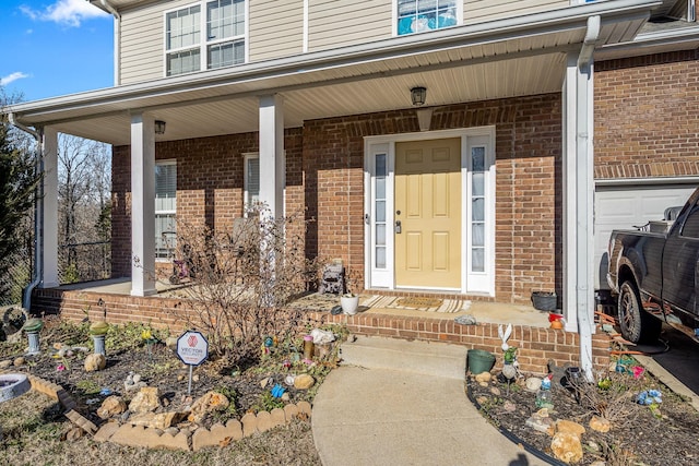 entrance to property with covered porch