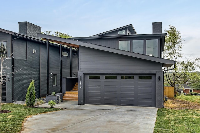 modern home featuring a garage