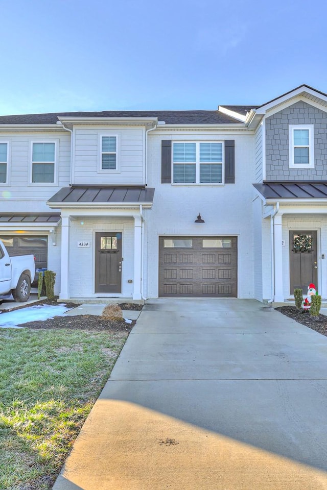 view of front of home with a garage