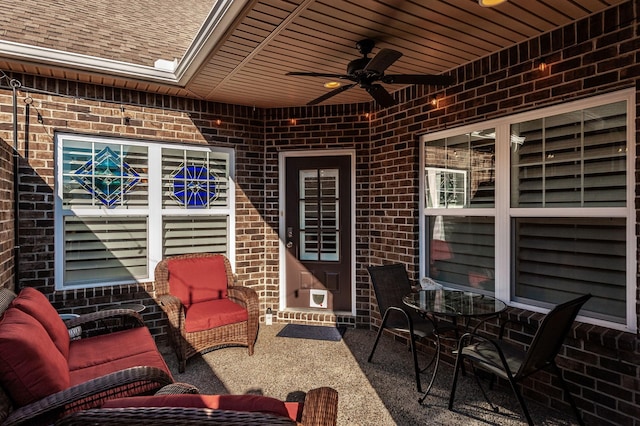 view of patio with ceiling fan and an outdoor living space