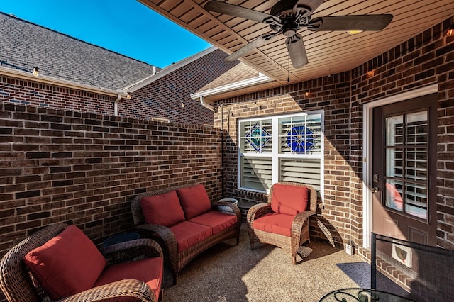 view of patio / terrace featuring ceiling fan and an outdoor living space