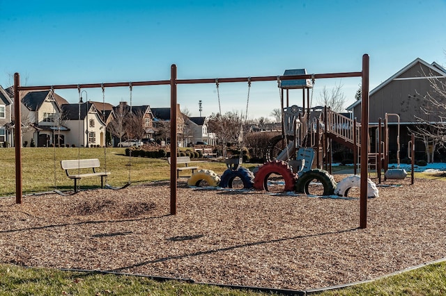 view of jungle gym with a lawn