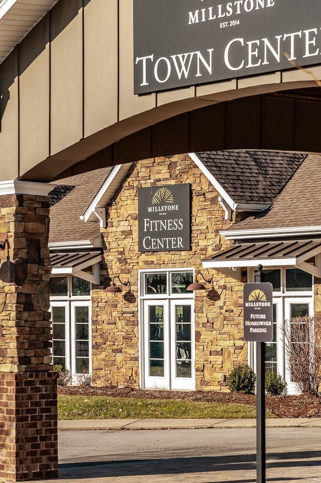 property entrance featuring french doors