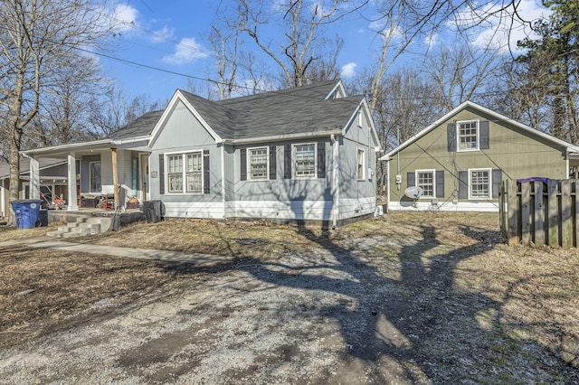 view of side of home featuring a porch