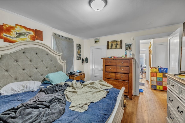 bedroom with light hardwood / wood-style floors