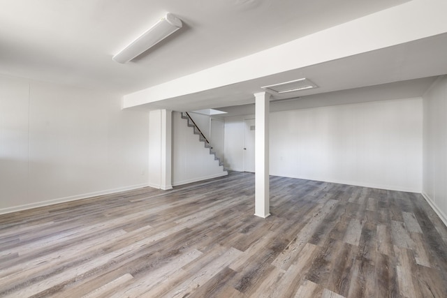 basement featuring hardwood / wood-style floors