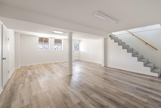 basement featuring light hardwood / wood-style flooring