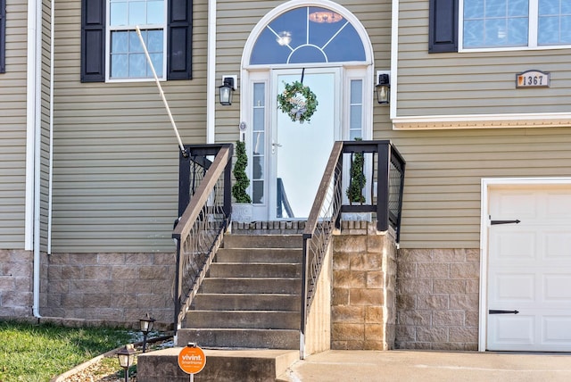 property entrance featuring a garage