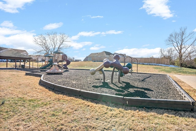 view of playground featuring a lawn