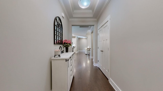 hallway featuring dark hardwood / wood-style floors and ornamental molding