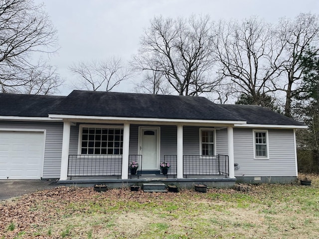 single story home featuring crawl space, an attached garage, and a porch