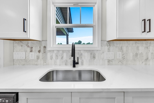 965 Palmyra Rd, Clarksville, TN 37040 - kitchen with a sink, white cabinets, backsplash, and plenty of natural light