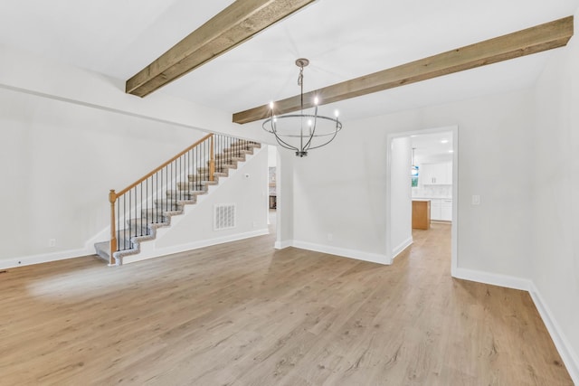 965 Palmyra Rd, Clarksville, TN 37040 - unfurnished living room with beamed ceiling, stairs, a chandelier, light wood-style floors, and baseboards