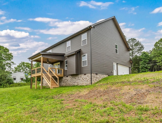965 Palmyra Rd, Clarksville, TN 37040 - back of house with a ceiling fan, crawl space, an attached garage, stairs, and a deck