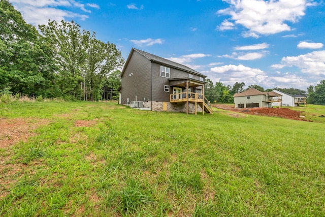 965 Palmyra Rd, Clarksville, TN 37040 - rear view of property featuring stairway, a deck, a yard, and central AC