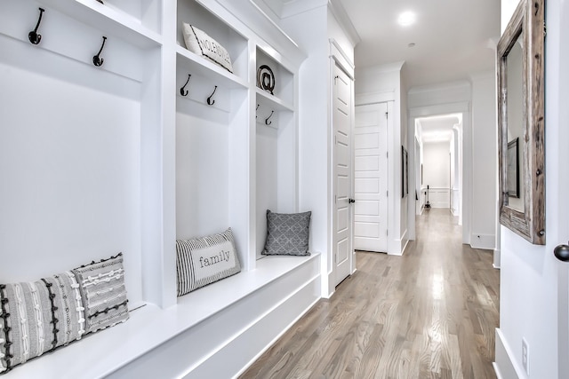 mudroom with hardwood / wood-style flooring