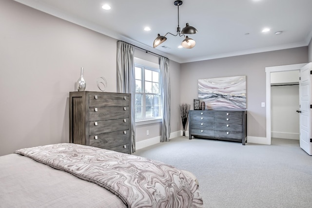 bedroom featuring crown molding and light colored carpet