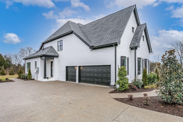 view of property exterior featuring a garage