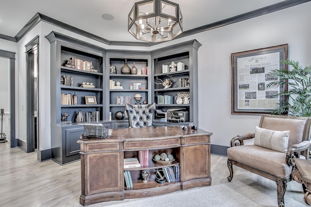 office space with crown molding, light wood-type flooring, and a notable chandelier