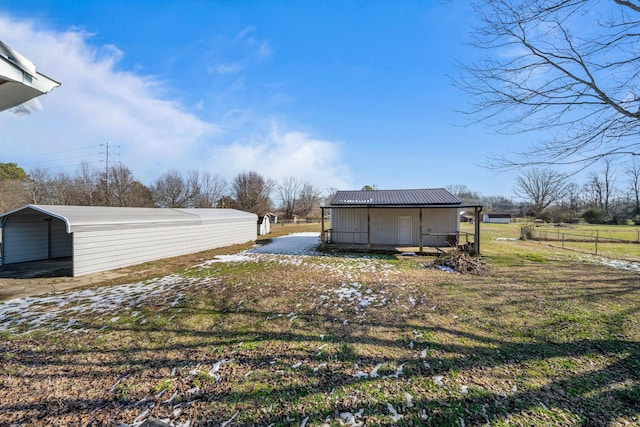 view of yard featuring a carport