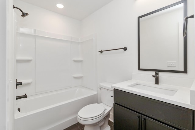 full bathroom featuring vanity, tub / shower combination, and toilet