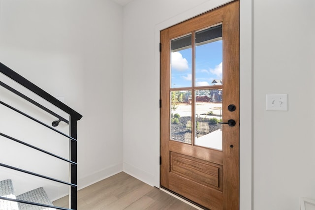 doorway featuring light wood-type flooring