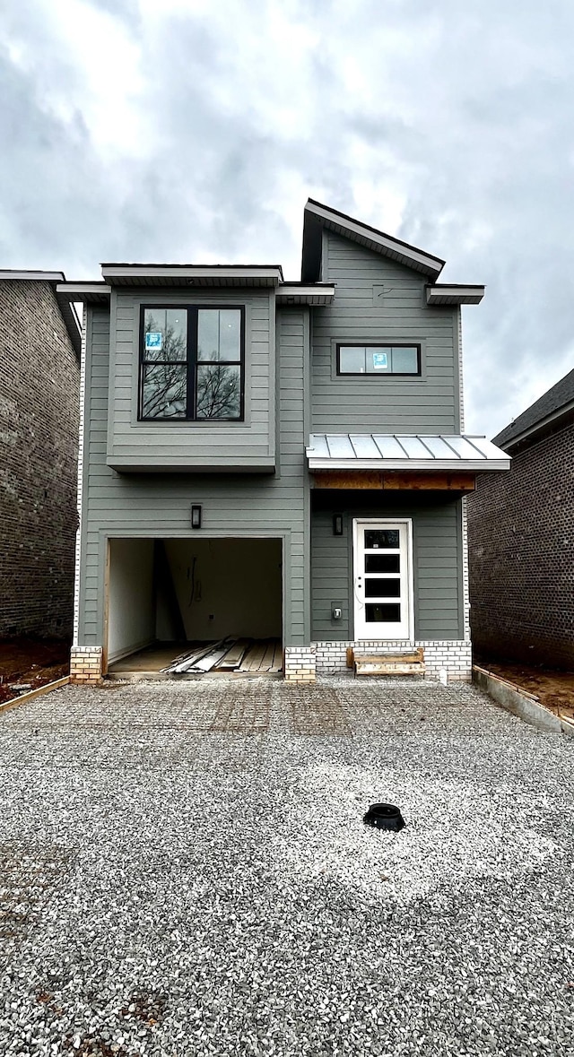 view of front of home with a garage