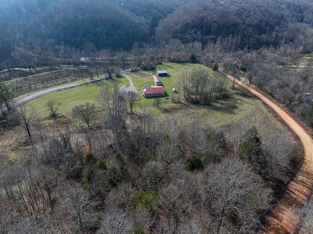 birds eye view of property with a rural view