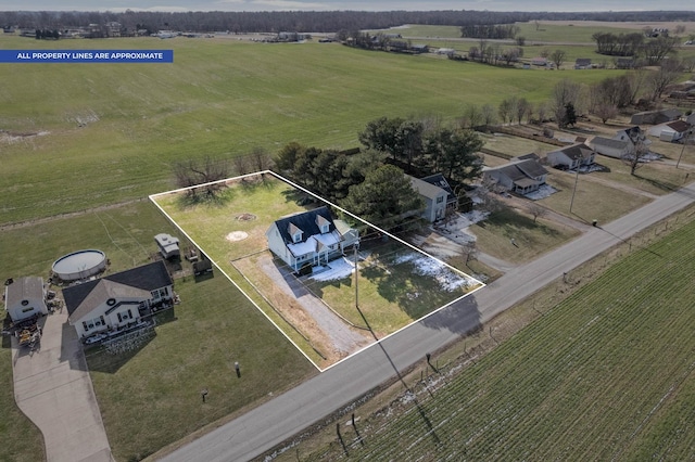 birds eye view of property featuring a rural view