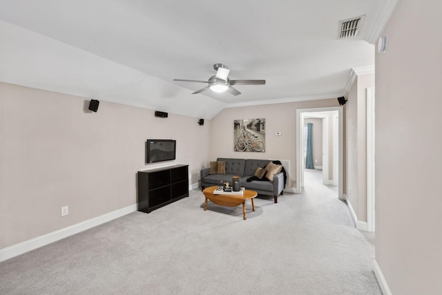 carpeted living room featuring ceiling fan, crown molding, and lofted ceiling