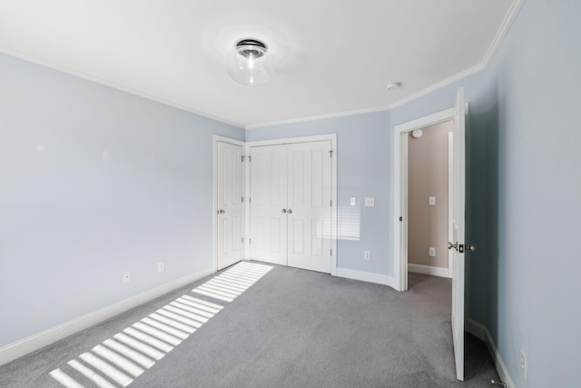 unfurnished bedroom featuring light colored carpet, a closet, and crown molding