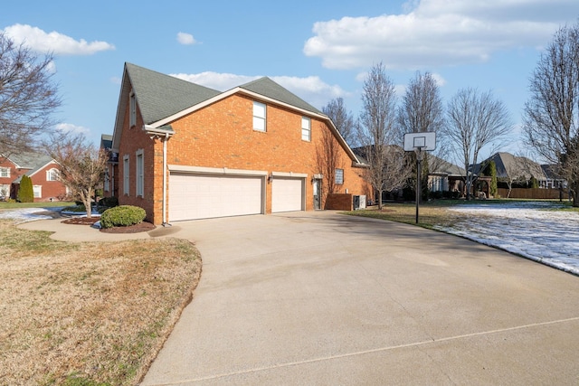 view of side of property featuring a garage