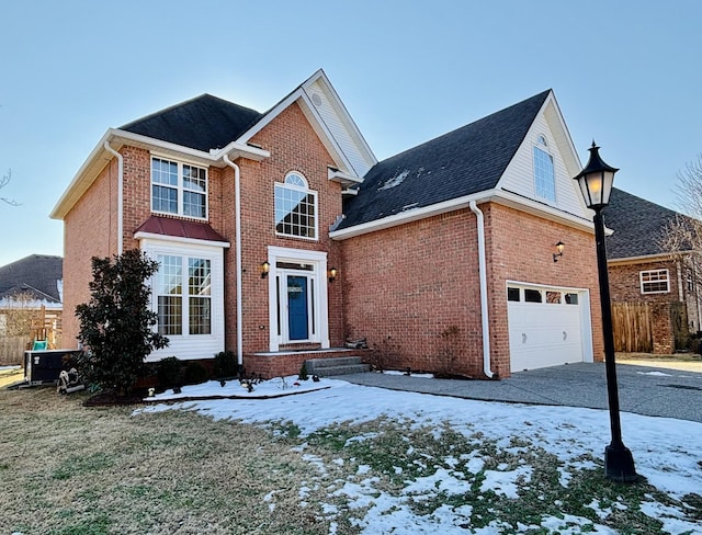 front facade with cooling unit and a garage