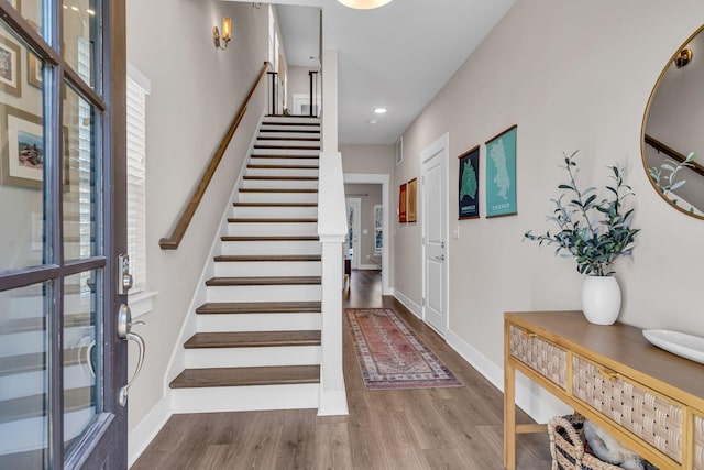 foyer entrance featuring hardwood / wood-style floors