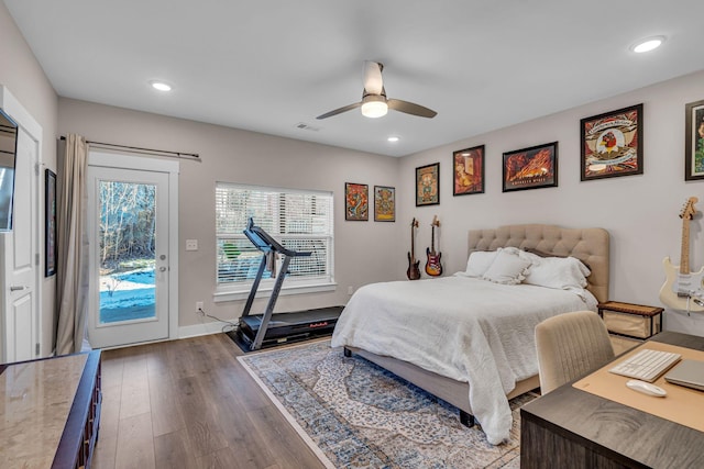 bedroom with wood-type flooring, ceiling fan, and access to exterior