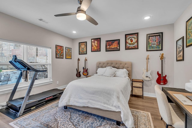 bedroom featuring ceiling fan and light wood-type flooring