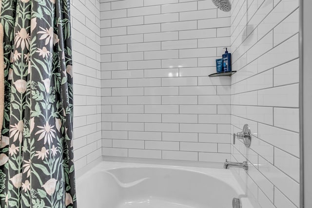 bathroom featuring shower / bathtub combination with curtain