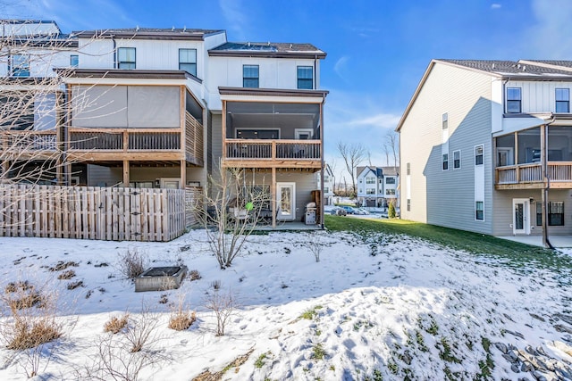 view of snow covered house