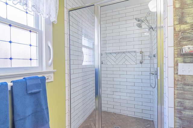 bathroom featuring an enclosed shower