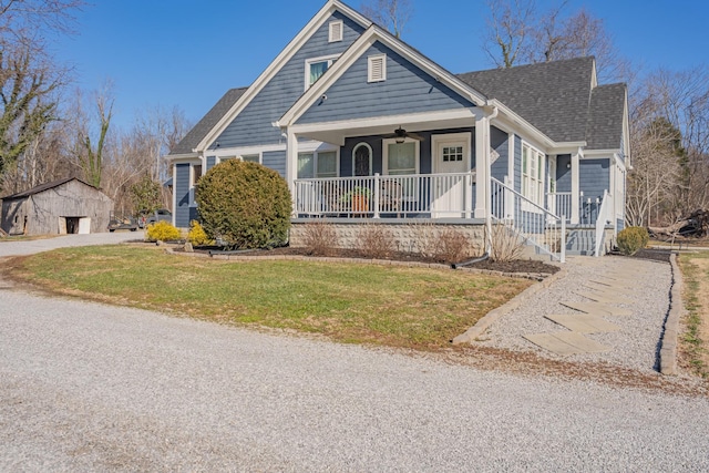 view of front of property featuring a front lawn and a porch